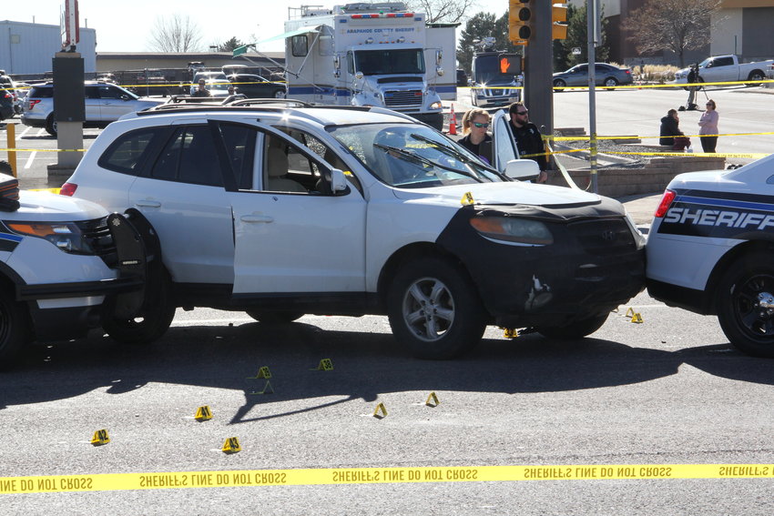 The white car a suspect was driving at the time he was boxed in by Arapahoe County Sheriff’s Office deputy cars before being shot after not complying with deputies’ commands Nov. 15, according to the sheriff’s office. Deputies pursued the suspect to the corner of East Arapahoe Road and South Dayton Street at about 9:15 a.m. after a reported domestic disturbance, and they saw him reach for what was believed to be a firearm, according to the sheriff’s office.